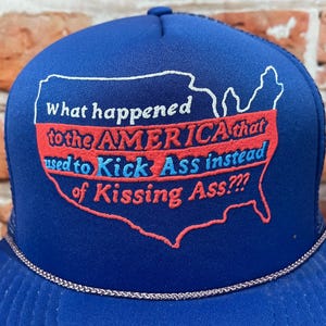 vtg What Happened To The America That Used to Kick Ass Insted Of Kissing Ass mesh trucker snapback hat 80s 90s usa patriot