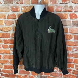 May include: A black windbreaker jacket with a green and white embroidered logo that says "Seahawks" and "Seattle, WA".