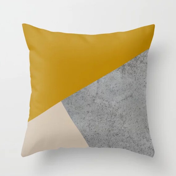 mustard and grey pillows