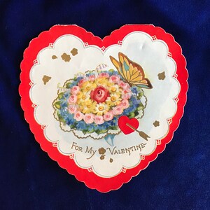 Valentijnsvlinder uit 1920 en bloemen 'regen of glans'-papieren hart