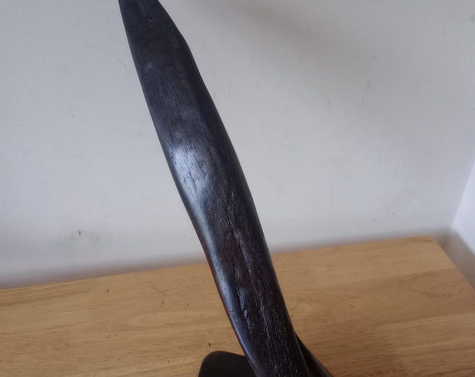 Eel fish sculpture made from Irish bog oak in Ireland