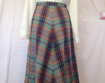 70's Tartan check wool A-line skirt. Modern size 10/12
