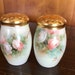 Austria Hand Painted China Salt and Pepper Shakers. Hand painted Roses. Three inches. Austrian Vintage China Painting. Gold topped. Great !