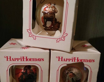Set of 3 Americo Inc. Ornaments in original boxes .