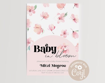 May include: Pink baby shower invitation with a floral design and the text "Baby in Bloom" and "Mitzi Monroe". The invitation includes the date, time, and location of the shower. The text "Personalize with Coryl" is also included.
