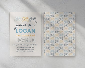 May include: A blue and yellow birthday invitation with a game controller design. The invitation says "game on! LOGAN has unlocked LEVEL 8" and includes details for the party.