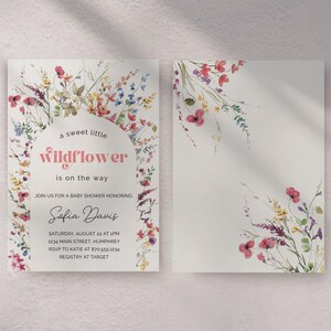 May include: A baby shower invitation with a watercolor floral design. The invitation reads "a sweet little wildflower is on the way" and includes the name "Sofia Davis".