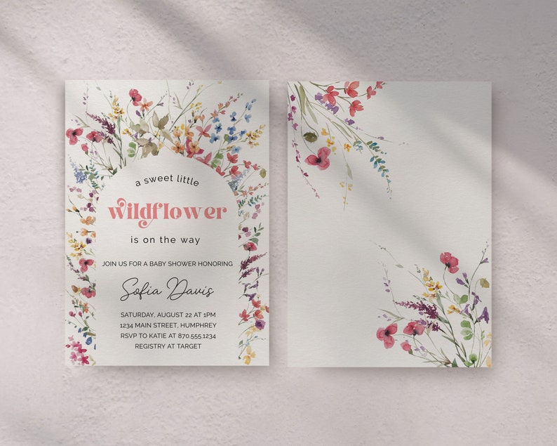 May include: A baby shower invitation with a watercolor floral design. The invitation reads "a sweet little wildflower is on the way" and includes the name "Sofia Davis".