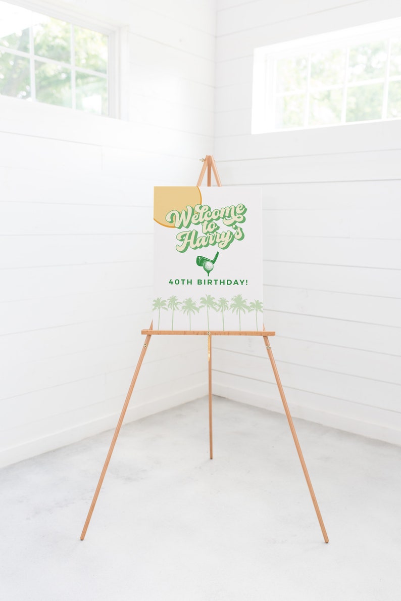 May include: Welcome to Harry's 40th Birthday sign with a golf ball and club graphic. The sign is on a wooden easel with a white background and green and yellow text.