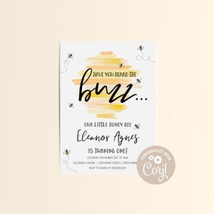 May include: A yellow and orange watercolor beehive with the text "Have you heard the buzz..." and the text "Our little honey bee Eleanor Agnes is turning one!"  The invitation includes the date, time, and location of the party.  The text "Personalize with Coryl" is in a circle with a gear icon.