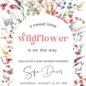 May include: A baby shower invitation with a watercolor floral border. The text reads "a sweet little wildflower is on the way." The invitation is for Sofia Davis and includes the date, time, location, RSVP information, and registry details.