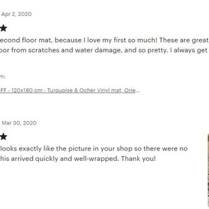May include: Two customer reviews for a vinyl floor mat. The first review is five stars and says "This is my second floor mat, because I love my first so much! These are great for protecting my wood floor from scratches and water damage, and so pretty. I always get compliments on them." The second review is also five stars and says "I LOVE it. It looks exactly like the picture in your shop so there were no surprises. This arrived quickly and well-wrapped. Thank you!" The image shows a close-up of the floor mat with four silver chair legs standing on it. The floor mat has a patterned design with blue, white, and brown colors.