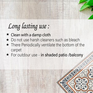 May include: Image with text about the long-lasting use of a product. The text includes instructions to clean with a damp cloth, avoid harsh cleaners, ventilate the bottom, and use outdoors in a shaded area. A knife and decorative tile are also visible.