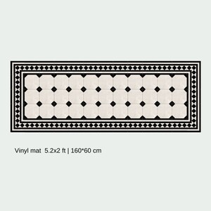 May include: Rectangular vinyl mat with a black and white geometric pattern. The mat features a border of black diamonds and a central grid of black squares on a cream background. The text on the mat reads: Vinyl mat 5.2x2 ft | 160*60 cm.