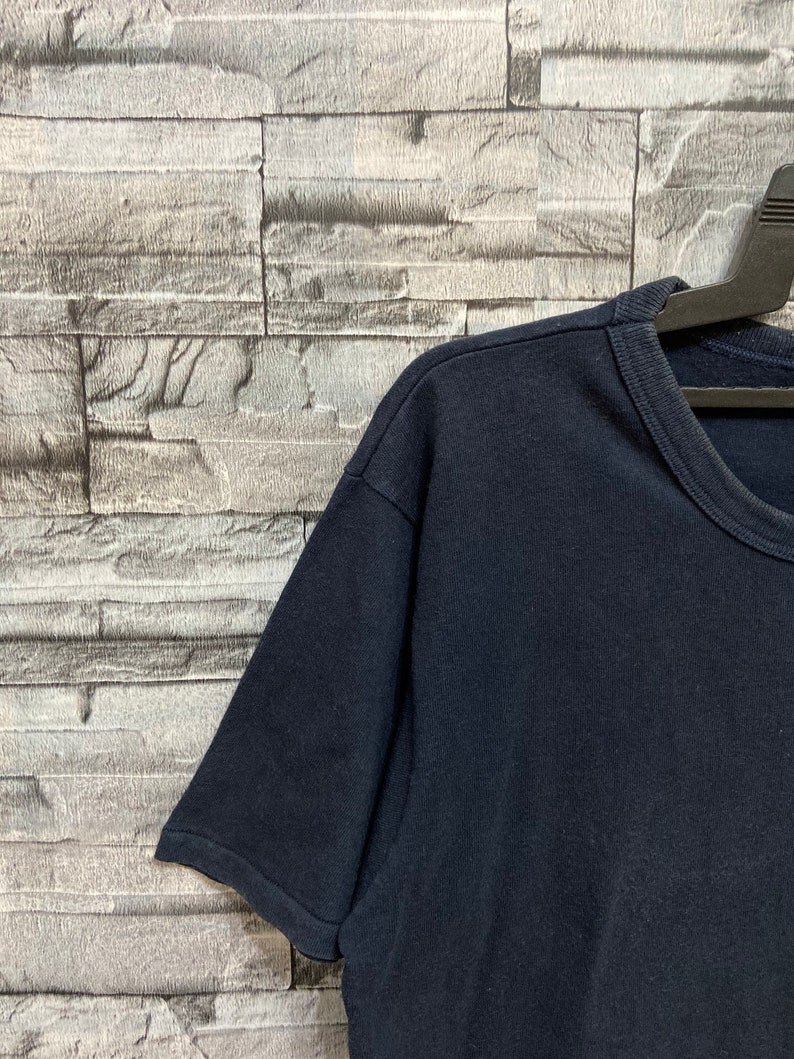 Vintage Champion t shirt spellout made in usa. vintage t shirt usa size L dark blue