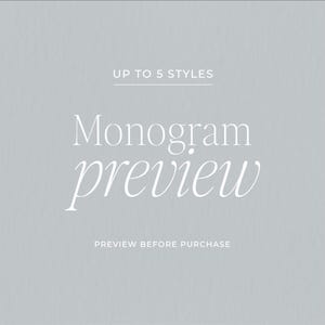 May include: A light gray background with white text that reads "UP TO 5 STYLES", "Monogram preview", and "PREVIEW BEFORE PURCHASE". The text is in a serif font.