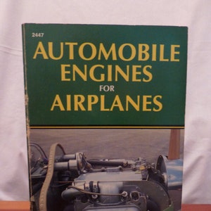 May include: A book titled "AUTOMOBILE ENGINES FOR AIRPLANES" with a green cover and yellow text. The cover features an image of an engine. The author's name, Joe Christy, is at the bottom.