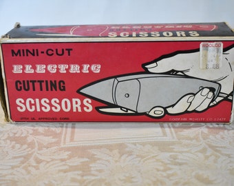 Vintage elektrisk mini-cut-sax från 1960-/70-talet