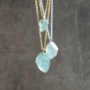 March birthstone gift. Raw aquamarine necklace in sterling silver