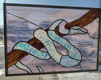 Lunar Snake, Chinese New Year, stained glass panel snake in tree. Titled "The Liar"