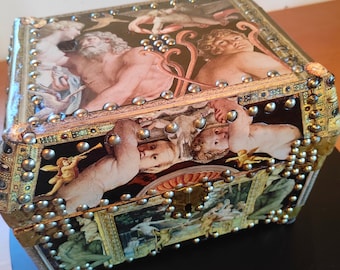 Small old studded leather chest with collage of baroque scenes that I named "the other story of the gods"