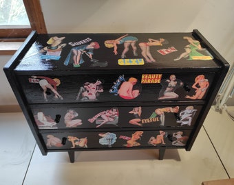 Small piece of furniture in black painted wood with collage of 50's American pin-ups "SPICY"