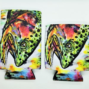 May include: Two colorful neoprene can coolers with a graphic of a trout fish head. The fish is painted in shades of green, yellow, orange, red, and blue. The background is white with a watercolor effect.