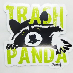 May include: A white sticker with a black and white raccoon peeking over the top. The words "Trash Panda" are written in green with a distressed look.