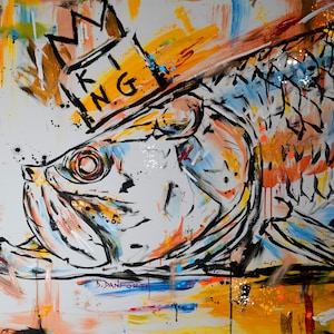 May include: A colorful abstract painting of a fish with a crown on its head. The crown is yellow and black with the word "KING" written on it. The fish is painted in shades of blue, white, and black. The background is a mix of yellow, orange, and white.