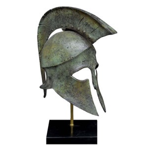 Corinthian pure bronze helmet on marble base - Olympia Museum Reproduction