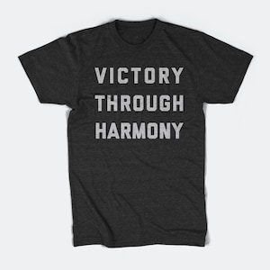 T-shirt pour homme - La victoire par l&#39;harmonie - Cadeau unisexe pour fan de football de Premier League