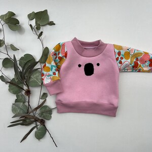 Koala face crew neck Jumper in Pink