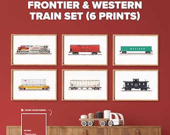 May include: A set of six framed art prints titled FRONTIER & WESTERN TRAIN SET (6 PRINTS) featuring illustrations of various train cars including a locomotive, a red boxcar, a green hopper, a yellow flatcar, a white hopper, and a black caboose.