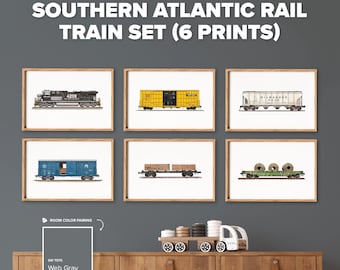 May include: A set of six framed wall art prints titled SOUTHERN ATLANTIC RAIL TRAIN SET (6 PRINTS). The prints feature illustrations of a black locomotive, a yellow boxcar, a white Milwaukee Road car, a blue boxcar, a flatcar, and a green car.