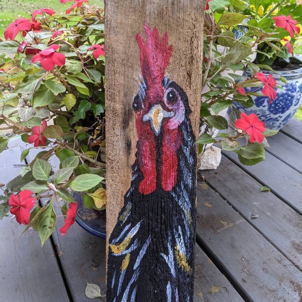 Barn wood rooster painted on reclaimed wood. 18 by 8 by 2 inches. Ships free in continental U S only.