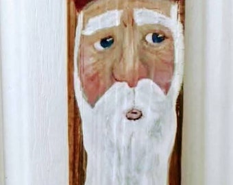 Santa painted on Driftwood vertical wall hanging.Ships free in continental U S only.