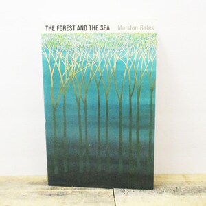 May include: A book titled "The Forest and the Sea" by Marston Bates. The cover features a watercolor illustration of a forest with trees silhouetted against a blue and green background.