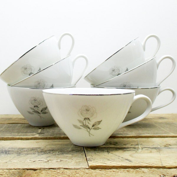 Set of 7 Vintage Tea Cups by Fashion Manor, in the Solitude Pattern. Lovely White and Silver Tea Cups with Grey Rose Design!