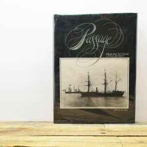 May include: A black hardcover book titled "Passage: From Sail to Steam, Captain's Log Book" with a black and white photo of a ship on the cover.