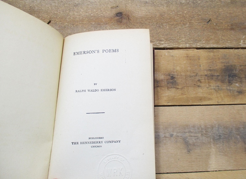 May include: A vintage book titled "Emerson's Poems" by Ralph Waldo Emerson, published by The Henneberry Company in Chicago.