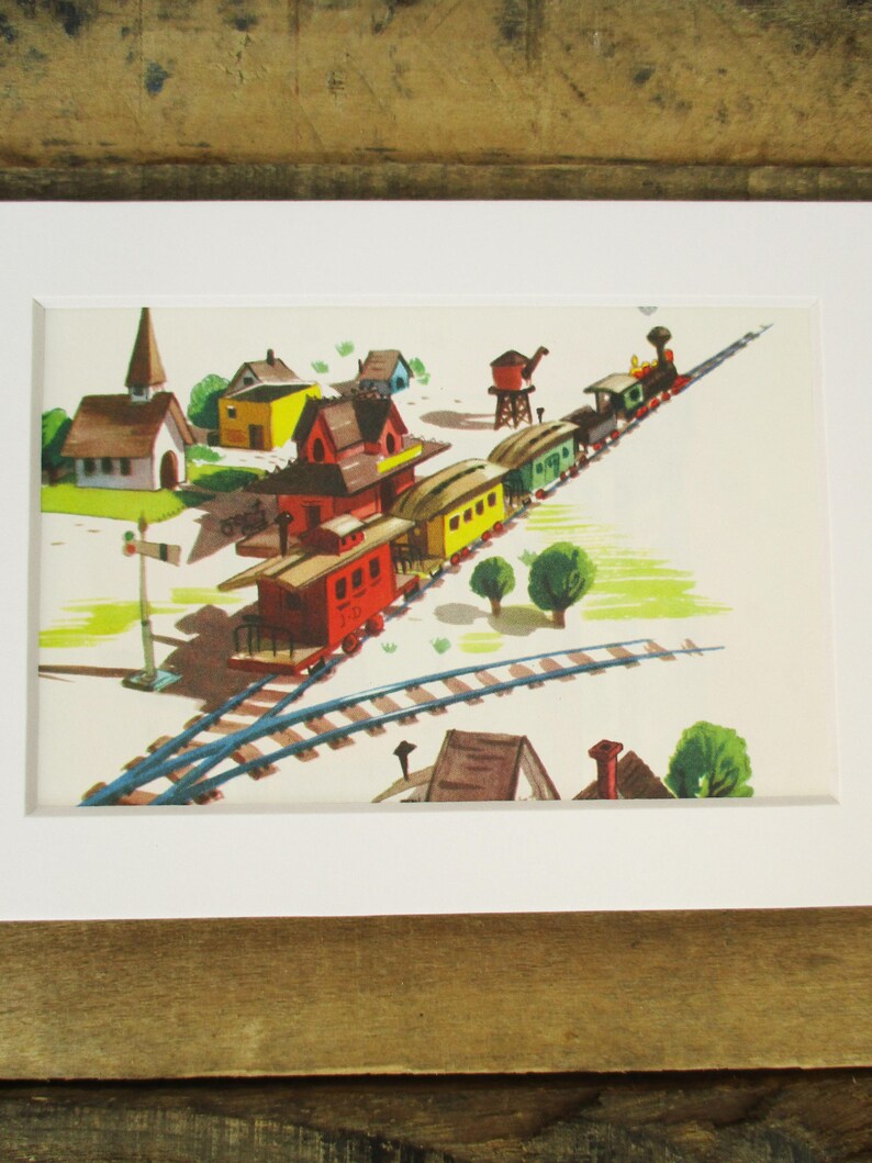 May include: A colorful illustration of a train pulling into a small town. The train is made up of a red engine, a yellow caboose, and several green and yellow boxcars. The town has a church with a steeple, a few houses, and a water tower. The train tracks are blue and the ground is green.