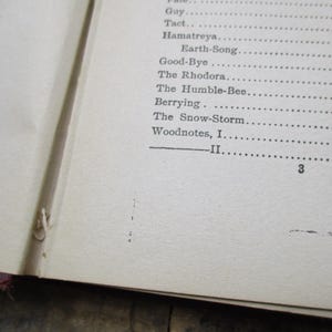 May include: A page from a book with a list of poems, including "Guy", "Tact", "Hamatreya", "Earth-Song", "Good-Bye", "The Rhodora", "The Humble-Bee", "Berrying", "The Snow-Storm", "Woodnotes, I", and "II". The page number is "3".