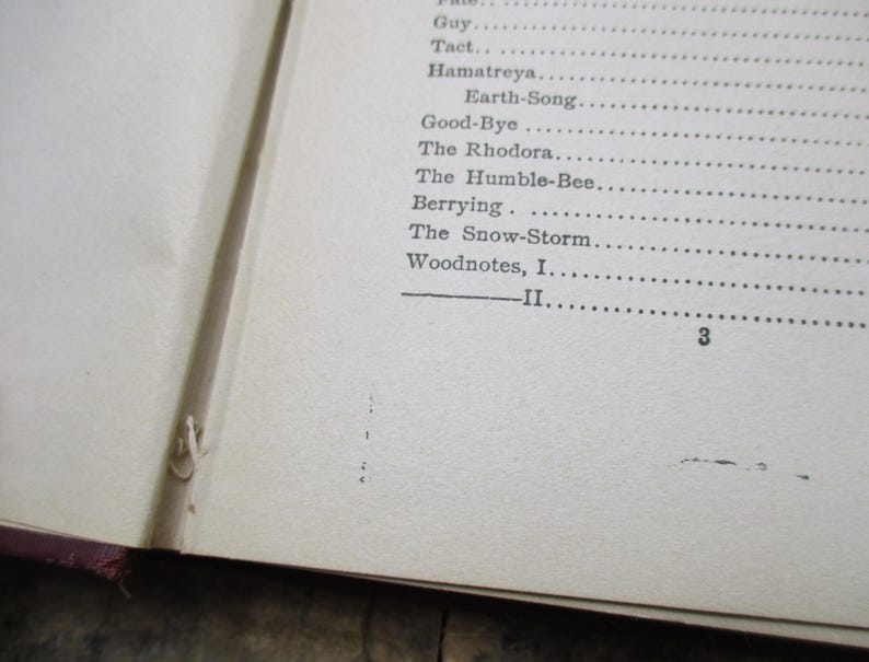 May include: A page from a book with a list of poems, including "Guy", "Tact", "Hamatreya", "Earth-Song", "Good-Bye", "The Rhodora", "The Humble-Bee", "Berrying", "The Snow-Storm", "Woodnotes, I", and "II". The page number is "3".