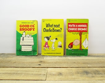 Set of Three Mid-Century Peanuts Paperbacks by Charles Schulz - Good Ol' Snoopy, What Next Charlie Brown?, and Your a Winner Charlie Brown