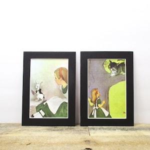 Pair of 1960&#39;s Alice in Wonderland Prints, featuring Alice, The White Rabbit, and the Chesire Cat.