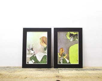 Pair of 1960's Alice in Wonderland Prints, featuring Alice, The White Rabbit, and the Chesire Cat.