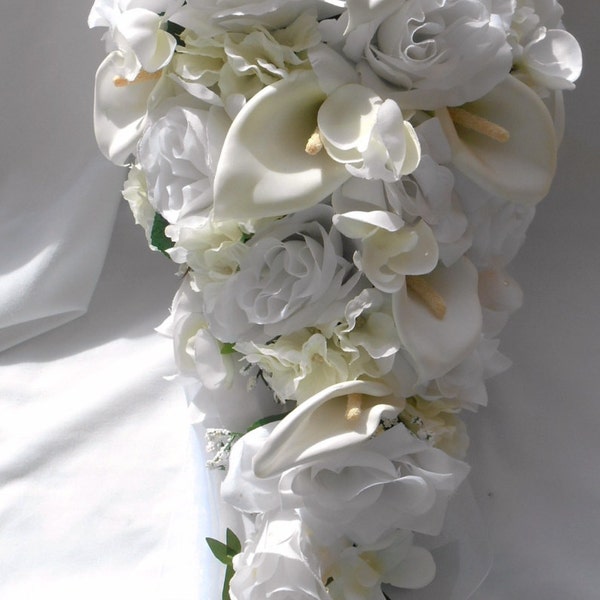 Cascade bridal bouquet and groom bout calla lilies and roses white and ivory