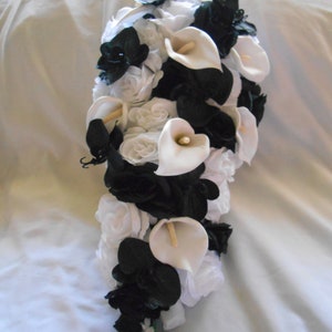 White and black orchids and calla lilies bouquet