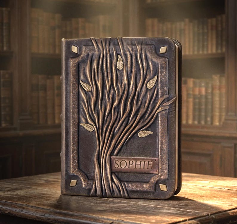 Personalized leather journal Tree Of Life, 3D cover with nameplate on an old table in the library