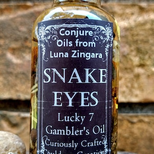 Snake Eyes Oil, Conjure Oil, Gamblers Oil, Fast Luck Oil, Lucky Conjure Oil, Fast Money Oil, Gambling Oil, Ritual Oils, Magick Oils